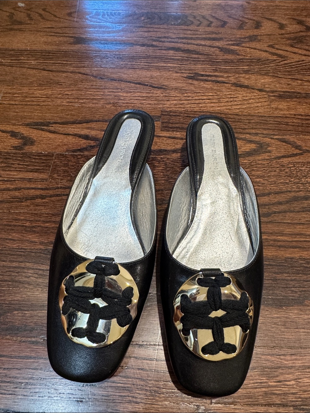 Tory Burch Black Slip-On Mules with Gold Logo Medallion